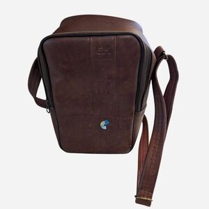 Vintage brown faux leather Kodak camera bag with an adjustable shoulder strap